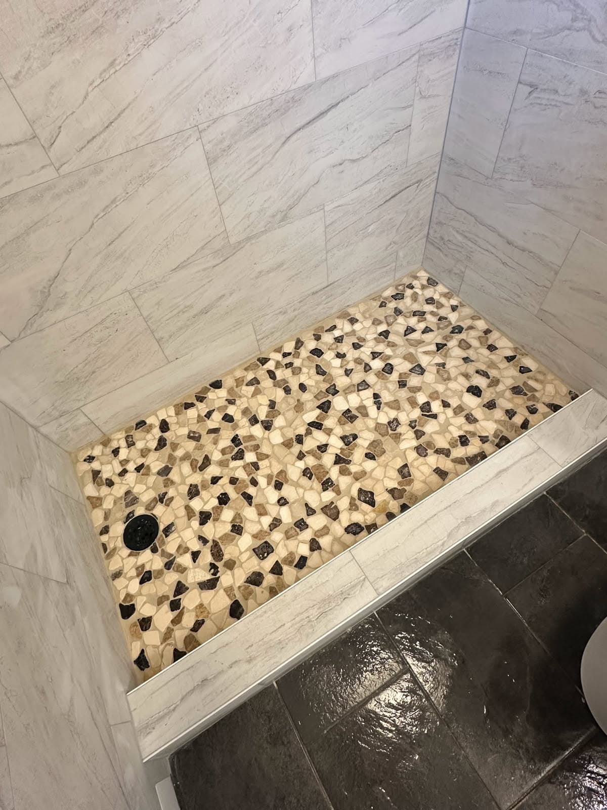 Project Elegant Natural Stone Shower Remodel image