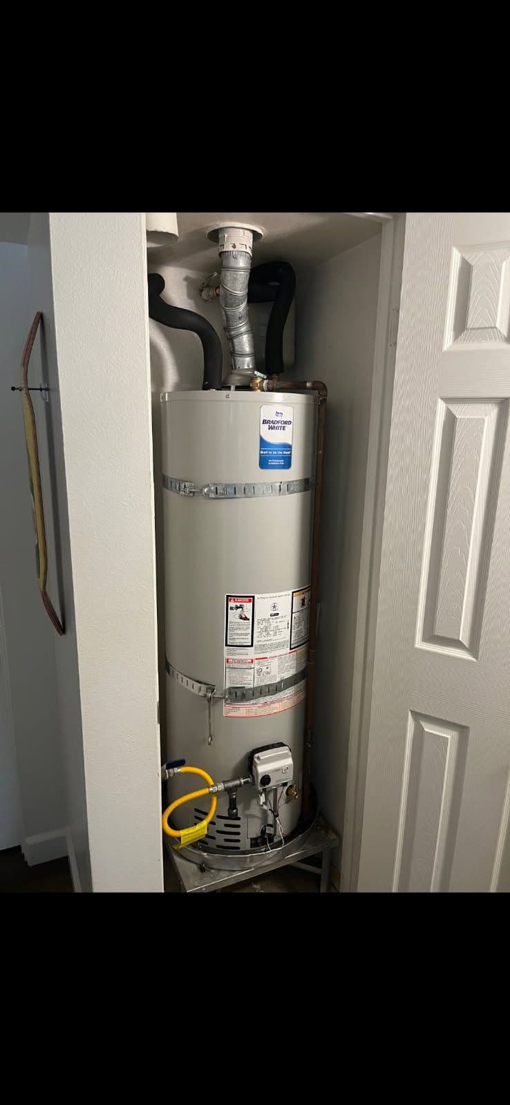 Top-Notch Water Heater Upgrade in Cozy Utility Space image