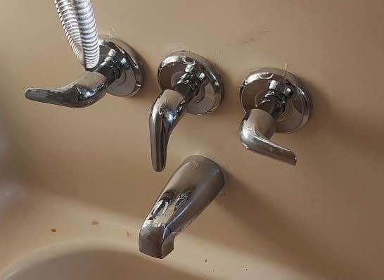Chrome Bathroom Fixture Transformation Increases Value image