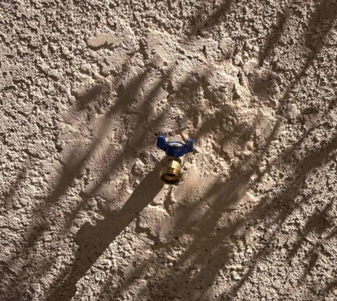 Flawless Stucco Repair and Outdoor Faucet Installation image